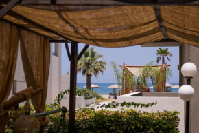 Chrispa's House Beachfront Bliss & Stunning Views